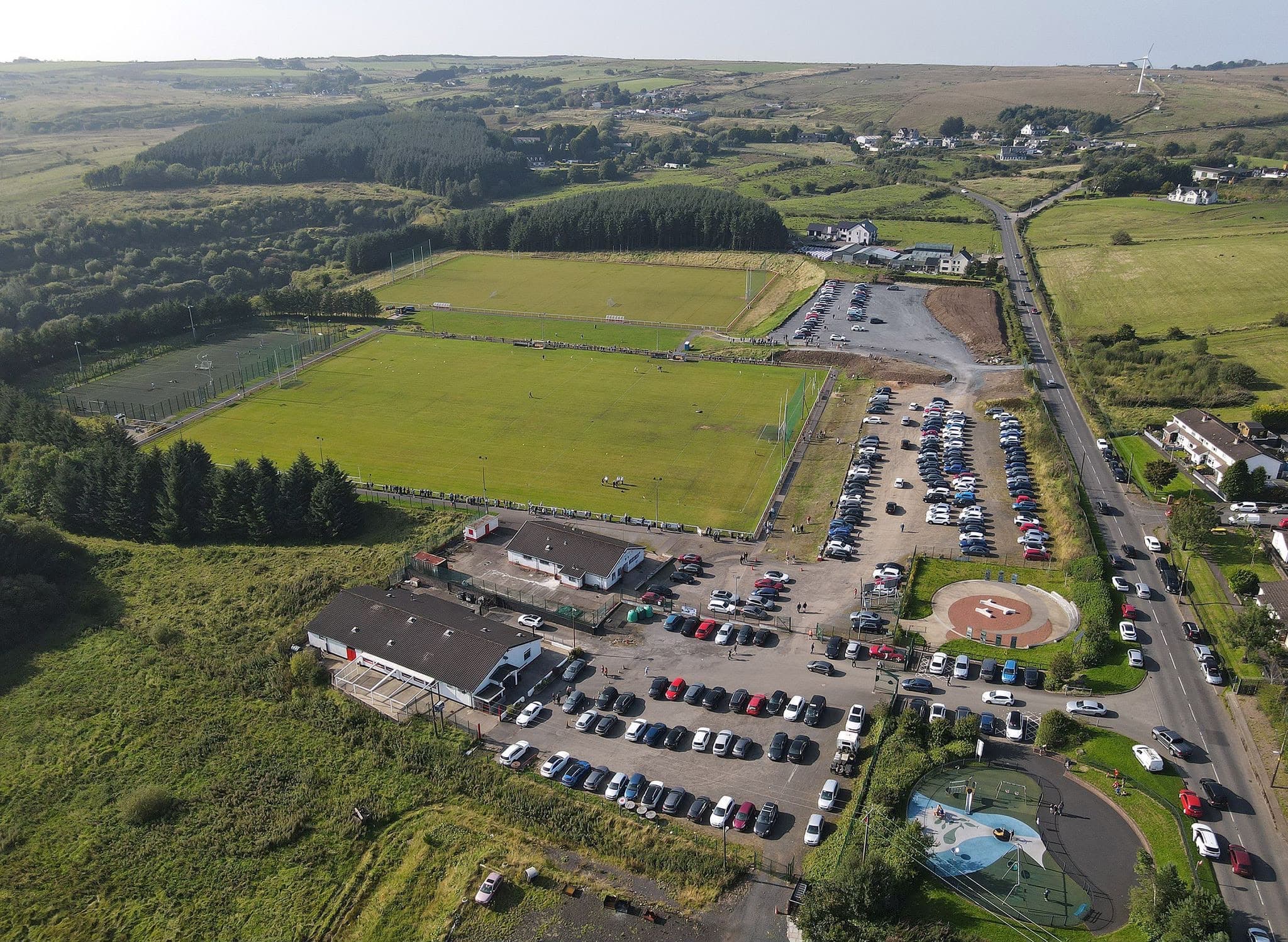 Aerial view of Lamh Dhearg club grounds and pitches at Hannahstown